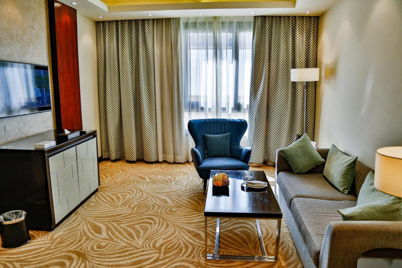 Triumph Luxury Hotel Каир Экстерьер фото Living room of a suite