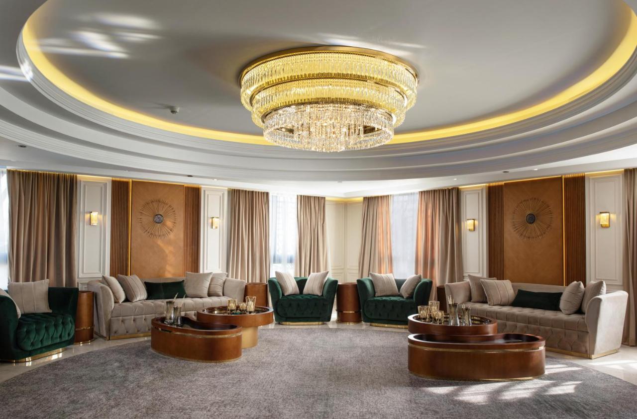 Triumph Luxury Hotel Каир Экстерьер фото 3D rendering of a living room