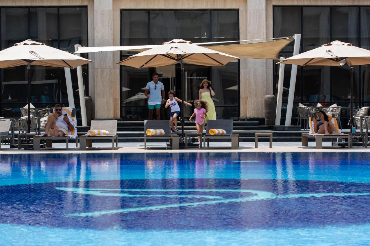 Triumph Luxury Hotel Каир Экстерьер фото The pool at the hotel