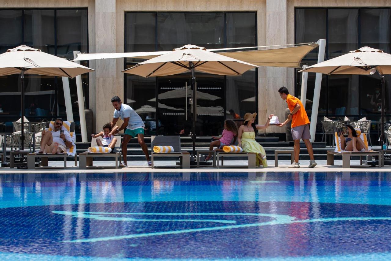 Triumph Luxury Hotel Каир Экстерьер фото The pool at the Ritz-Carlton, Dubai
