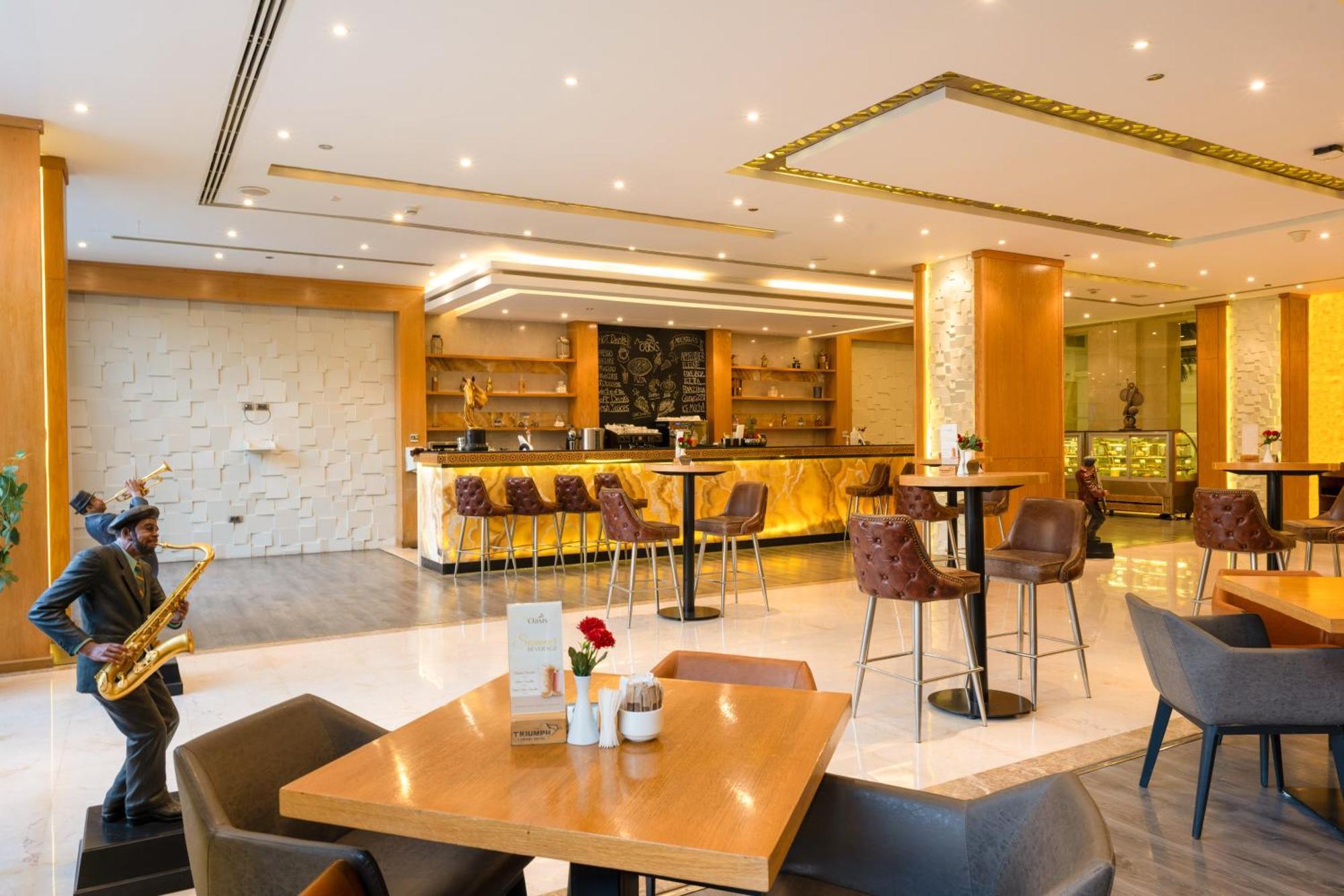 Triumph Luxury Hotel Каир Экстерьер фото The lounge at the airport