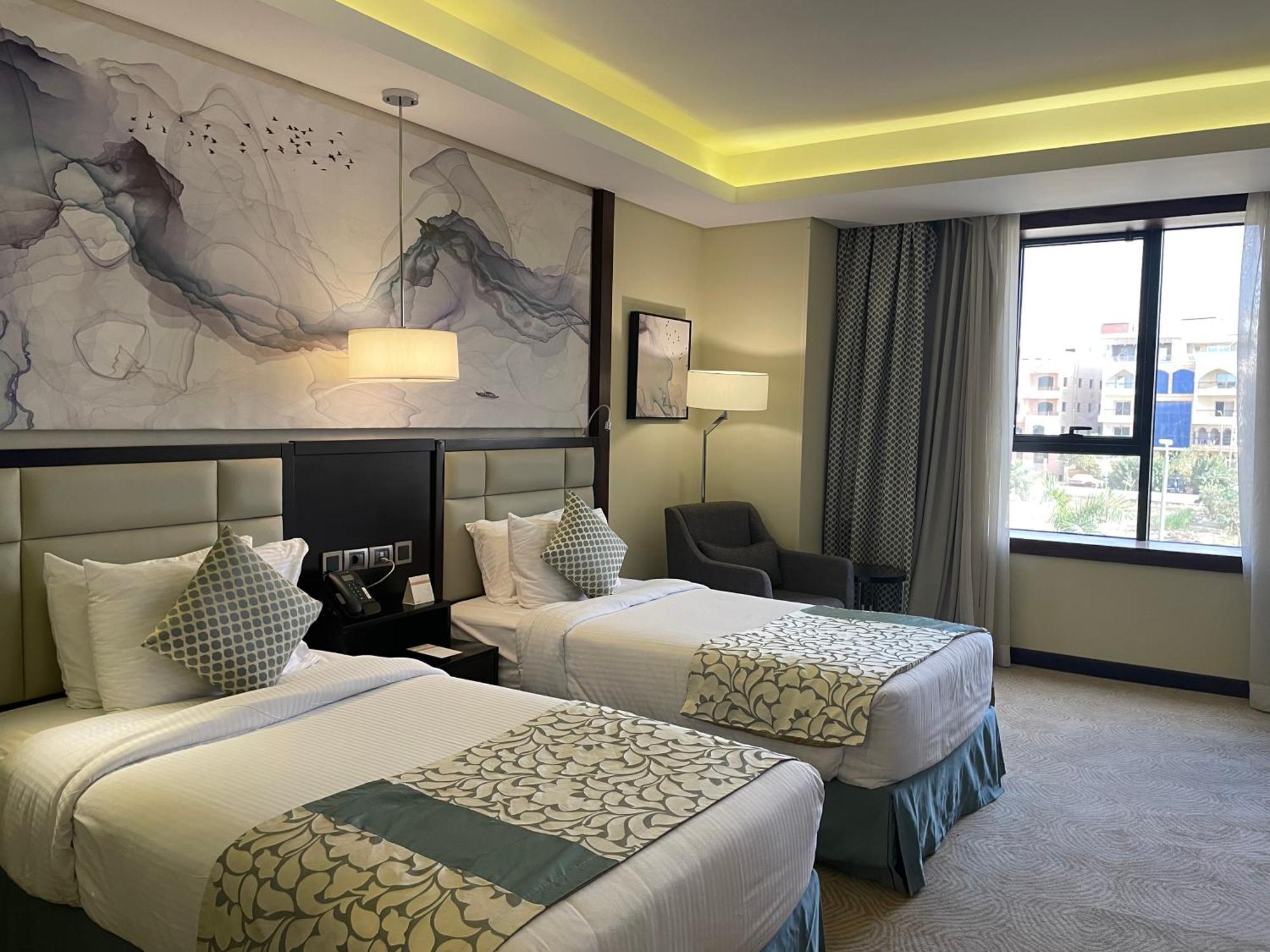 Triumph Luxury Hotel Каир Экстерьер фото A room at the hotel